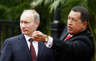 Президент Венесуэлы Уго Чавес встречает премьер-министра России Владимира Путина