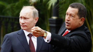 Президент Венесуэлы Уго Чавес встречает премьер-министра России Владимира Путина