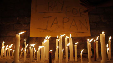 траур по погибшим при землетрясение в японии
