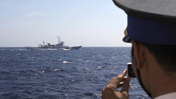 Китайский корабль береговой охраны в водах Южно-Китайского моря, на которые претендуют Китай и Вьетнам
