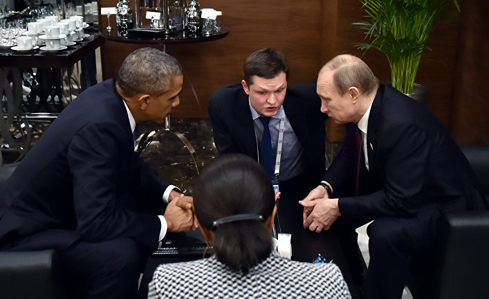 Президент России Владимир Путин во время беседы с президентом США Бараком Обамой на полях саммита "Группы двадцати" (G20)