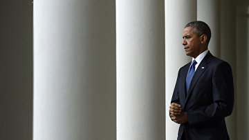 Барак Обама в Белом доме в Вашингтоне