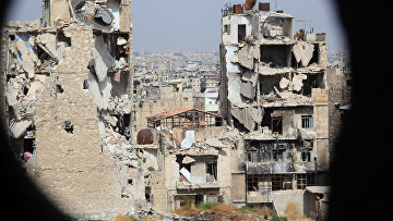 Вид на Алеппо со стороны пригорода, контролируемого правительственными войсками