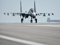Истребитель СУ-30 СМ готовится к вылету с авиабазы Истребитель СУ-30 СМ готовится к вылету с авиабазы