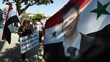Сторонники президента Сирии Башара Асада
