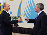 Президент России Владимир Путин и президент МОК Томас Бах