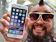 Первый покупатель нового смартфона Apple iPhone 6 в Токио Первый покупатель нового смартфона Apple iPhone 6 в Токио