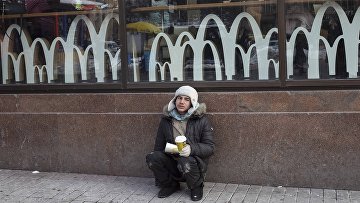 Попрошайка в центре Киева