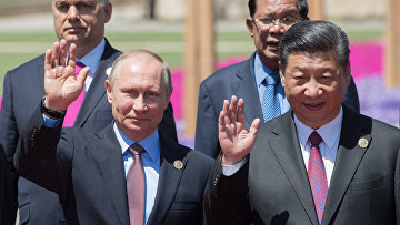Президент РФ Владимир Путин и председатель КНР Си Цзиньпин на форуме «Один пояс, один путь»