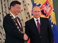 Президент РФ Владимир Путин и председатель Китайской Народной Республики Си Цзиньпин во время встречи. 4 июля 2017