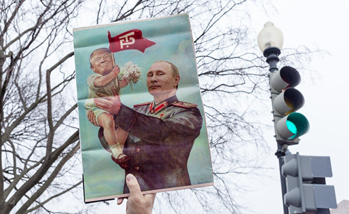 Плакат во время женского марша в Вашингтоне