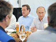 Владимир Путин и экс-канцлер ФРГ Герхард Шредер во время поездки в Северо-Западный федеральный округ