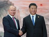 Владимир Путин и председатель КНР Си Цзиньпин перед заседанием Совета ШОС. 10 июня 2018 Владимир Путин и председатель КНР Си Цзиньпин перед заседанием Совета ШОС. 10 июня 2018