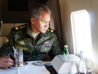 Министр обороны РФ Сергей Шойгу во время облета забайкальского полигона "Цугол", где проходит основной этап военных маневров "Восток-2018"