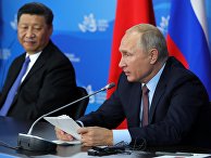 Президент РФ Владимир Путин и председатель КНР Си Цзиньпин на пресс-конференции по итогам встречи на полях IV Восточного экономического форума Президент РФ Владимир Путин и председатель КНР Си Цзиньпин на пресс-конференции по итогам встречи на полях IV Восточного экономического форума