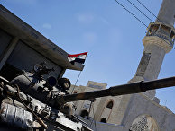 Танк сирийских военных в деревне Хосн