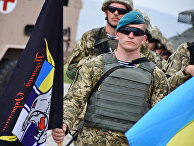Военнослужащий армии Украины на открытии международных военных учений под эгидой НАТО в Грузии Военнослужащий армии Украины на открытии международных военных учений под эгидой НАТО в Грузии