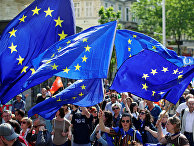 Флаги Европейского Союза во время митинга против национализма в Вене, Австрия