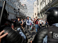Участники акции протеста в Москве Участники акции протеста в Москве