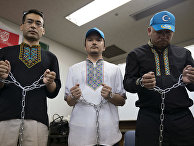 Уйгурские правозащитники во время пресс-конференции