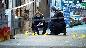 Полиция на месте, где застрелили 15-летнего подростка, Мальмё, Швеция