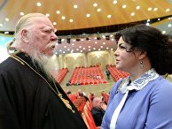 Протоиерей Дмитрий Смирнов и политик Елена Николаева на открытии XX Всемирного русского народного собора Протоиерей Дмитрий Смирнов и политик Елена Николаева на открытии XX Всемирного русского народного собора