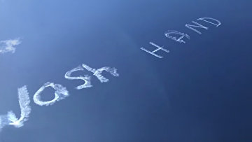 Message from the sky: 'wash hands' message painted over Sydney