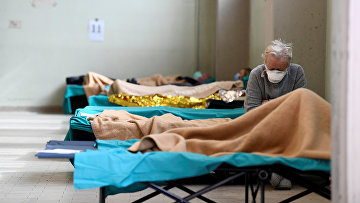 Пациенты в больнице в Брешии, Италия