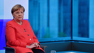 Ангела Меркель во время интервью на немецком телевидении