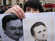 Участница митинга за реформу правоохранительных органов Участница митинга за реформу правоохранительных органов