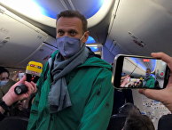 Алексей Навальный в самолете перед вылетом в Москву Алексей Навальный в самолете перед вылетом в Москву