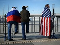 Болельщики с флагами России и США в Олимпийском парке в Сочи Болельщики с флагами России и США в Олимпийском парке в Сочи
