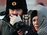 Туристы на Красной площади в Москве Туристы на Красной площади в Москве
