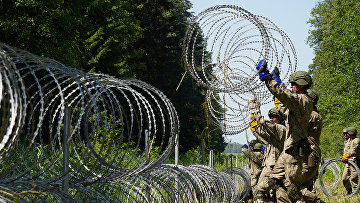 зачем белоруссия пропускает мигрантов в литву. Смотреть фото зачем белоруссия пропускает мигрантов в литву. Смотреть картинку зачем белоруссия пропускает мигрантов в литву. Картинка про зачем белоруссия пропускает мигрантов в литву. Фото зачем белоруссия пропускает мигрантов в литву