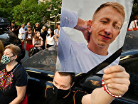 Участники митинга с фотографиями Виталия Шишова у посольства Беларуси в Киеве Участники митинга с фотографиями Виталия Шишова у посольства Беларуси в Киеве