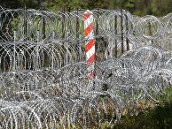 Пограничные столбы на белорусско-польской границе возле деревни Уснар-Дольное Пограничные столбы на белорусско-польской границе возле деревни Уснар-Дольное