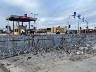 Ограждения и колючая проволока в районе контрольно-пропускного пункта "Брузги" на белорусско-польской границе Ограждения и колючая проволока в районе контрольно-пропускного пункта "Брузги" на белорусско-польской границе