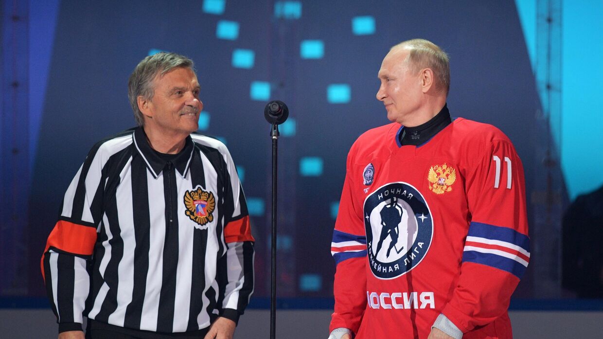 Президент РФ В. Путин и президент Международной федерации хоккея на льду Рене Фазель