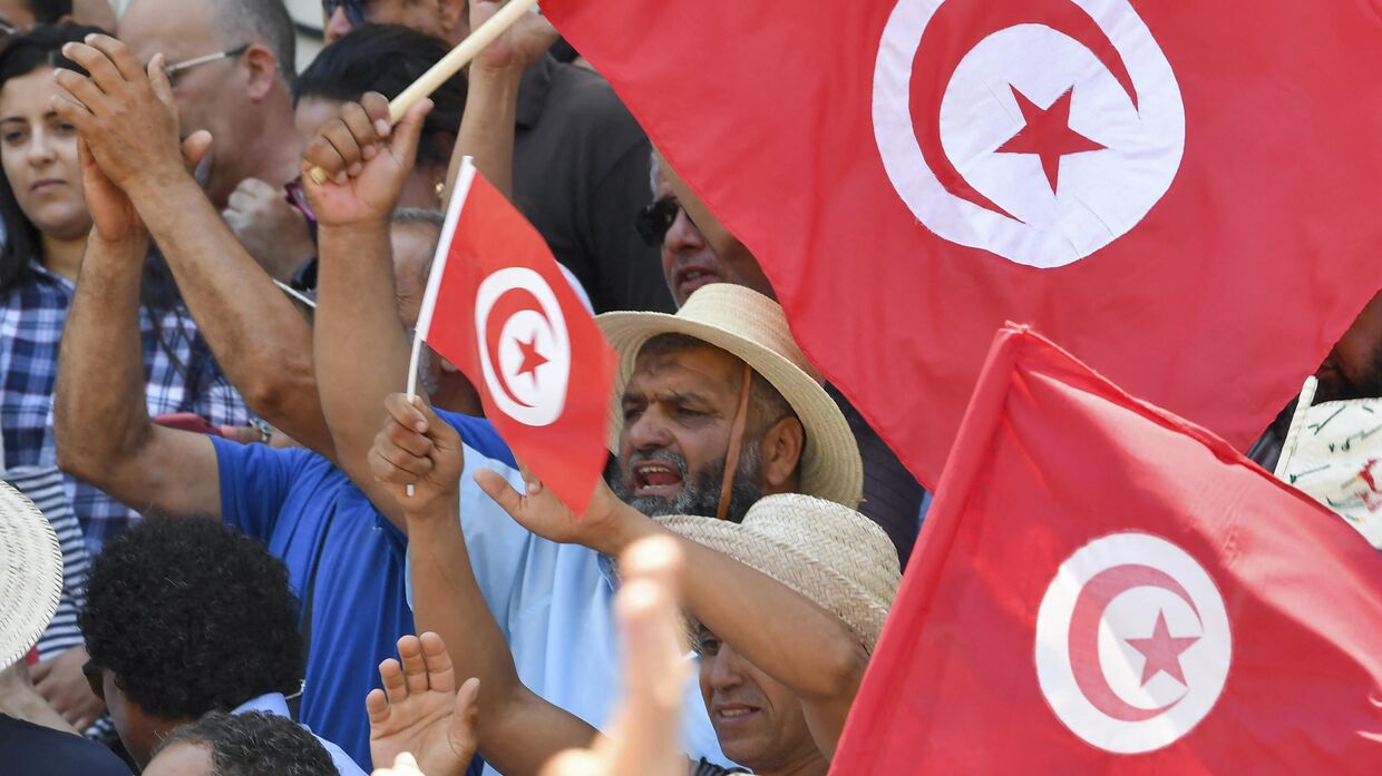 19 июня 2022 года. Участники акции протеста в Тунисе
