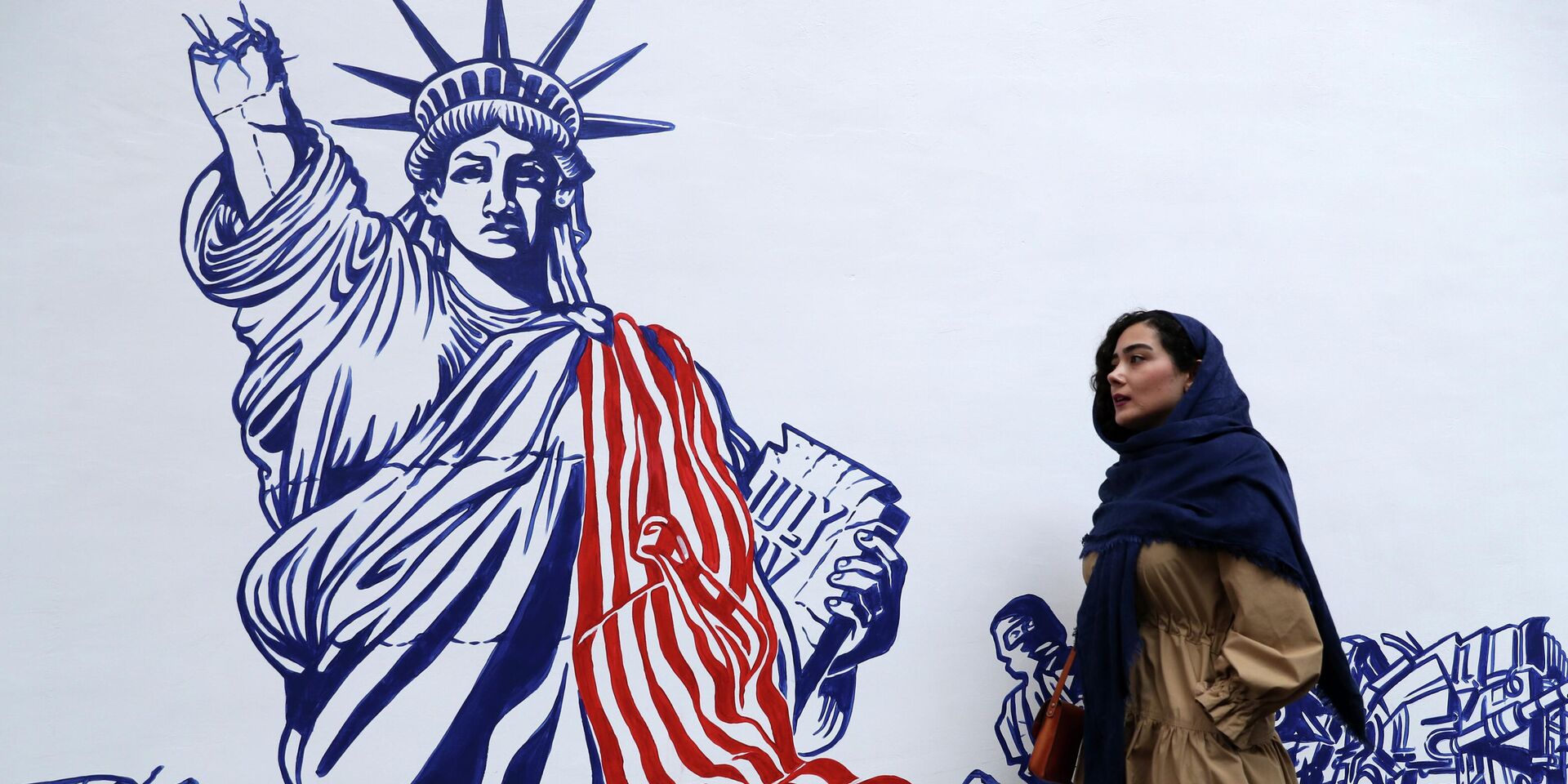 Граффити, изображающее карикатуру на Статую Свободы в Тегеране, Иран - ИноСМИ, 1920, 22.08.2022