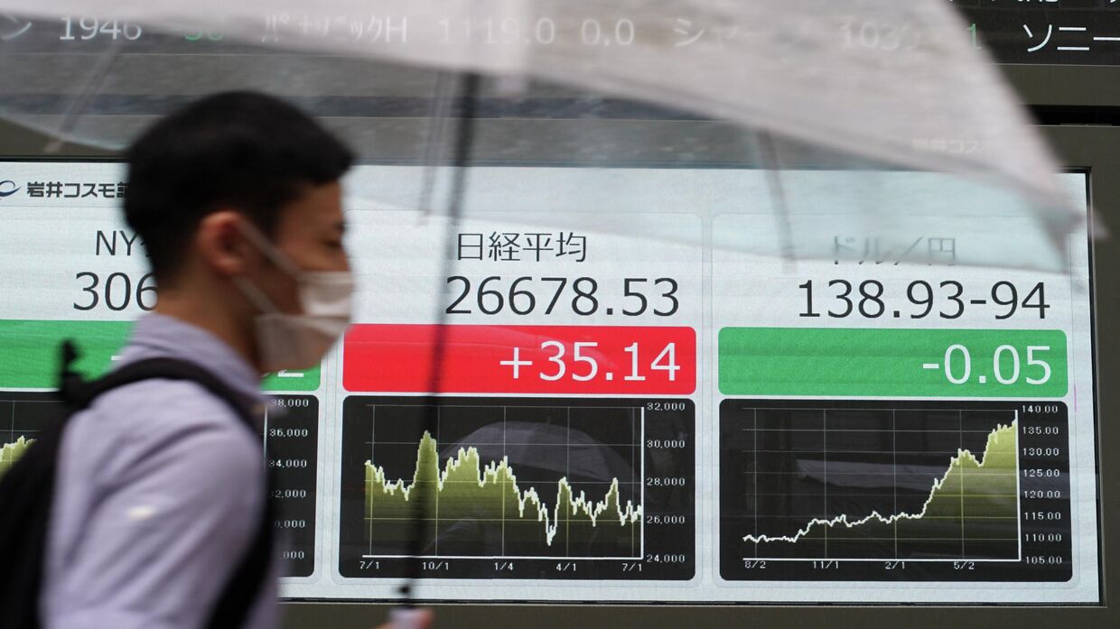 Электронное табло Токийской фондовой биржи