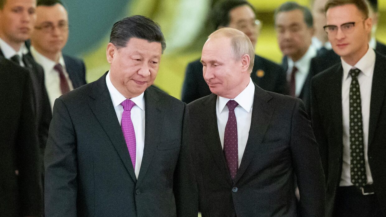 Президент России Владимир Путин и председатель КНР Си Цзиньпин в Москве