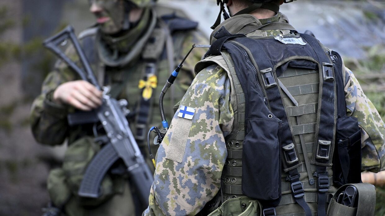 Финские солдаты во время военных учений в Канкаанпгге, Финляндия. 4 мая 2022 года