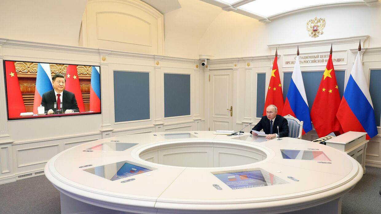 Президент РФ В. Путин провел переговоры с председателем КНР Си Цзиньпином