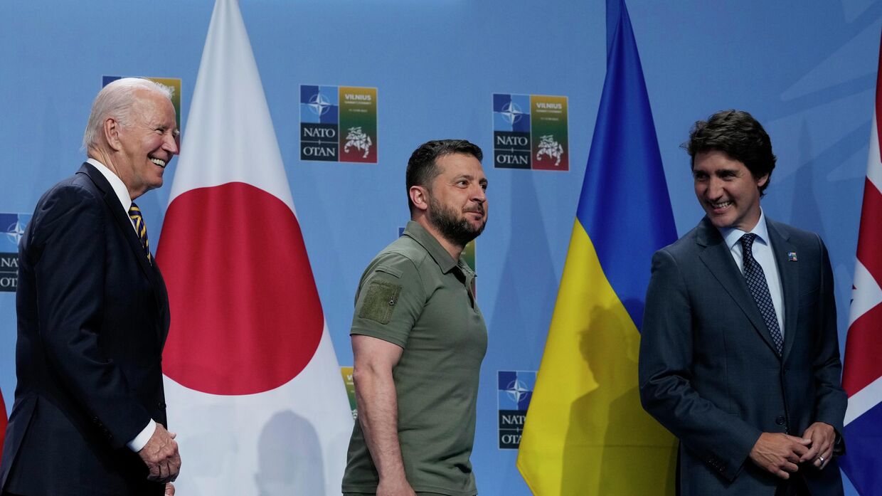 Президент США Джо Байден, президент Украины Владимир Зеленский и премьер-министр Канады Джастин Трюдо на полях саммита НАТО в Вильнюсе, Литва, 12 июля 2023 года