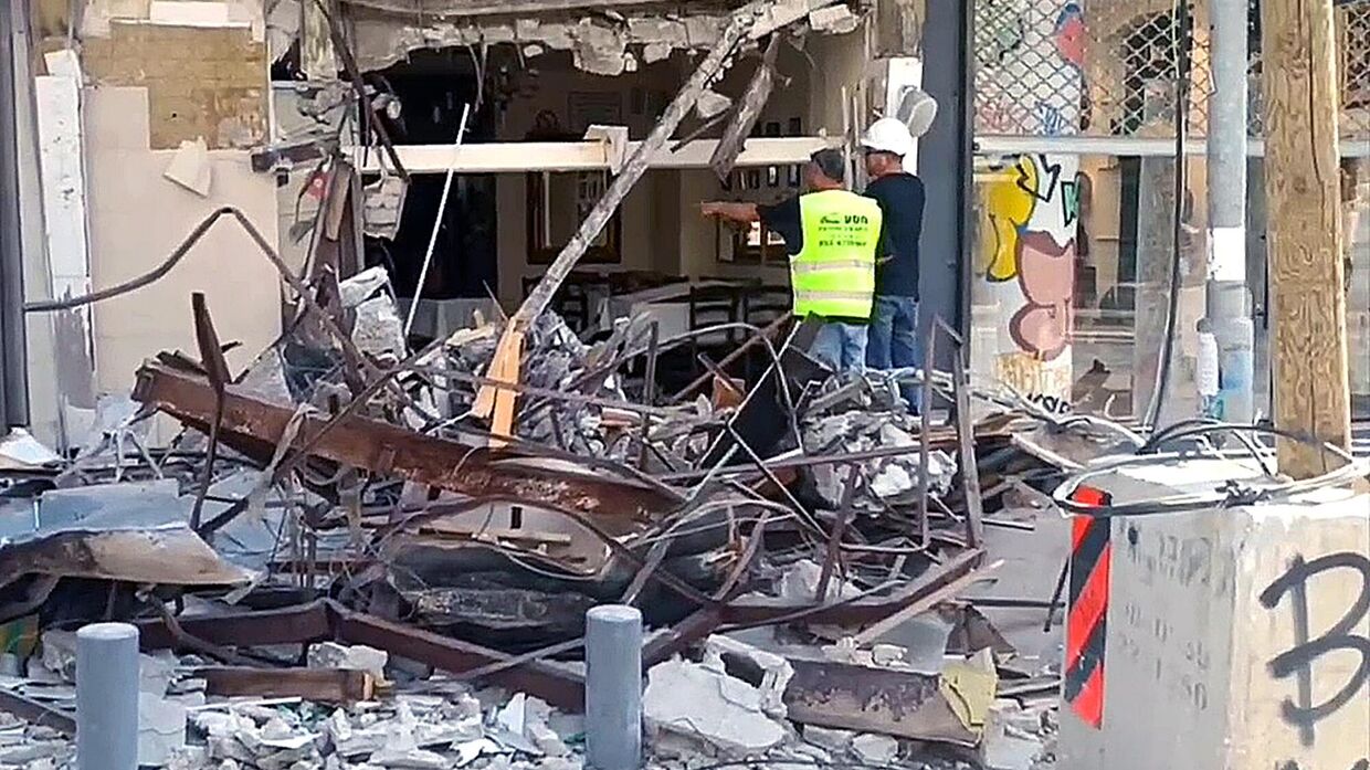 Обострение палестино-израильского конфликта. Здание, пострадавшее в результате ракетных ударов по Тель-Авиву.