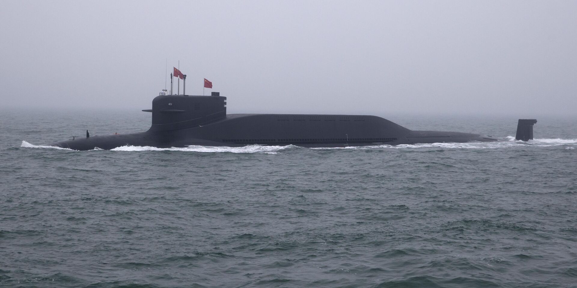 Атомная подводная лодка Long March 11 типа 094A класса Jin Народно-освободительной армии Китая (НОАК) принимает участие в военно-морском параде в честь 70-й годовщины основания ВМС НОАК Китая. 23 апреля 2019 года - ИноСМИ, 1920, 22.11.2023