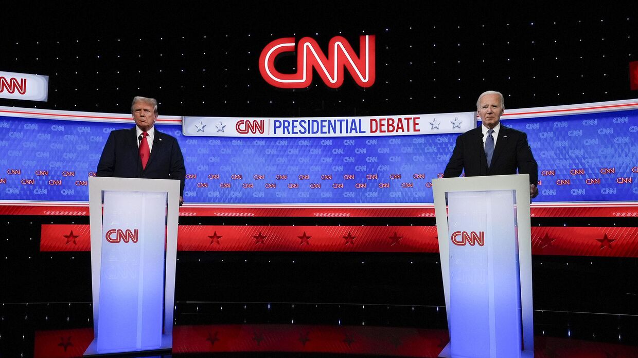 Кандидат в президенты от Республиканской партии, бывший президент Дональд Трамп и президент Джо Байден на дебатах, 27 июня 2024 года