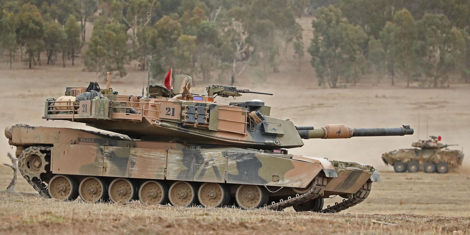 Танк Abrams M1A1 готовится к стрельбе во время учений на военном полигоне  в Сеймуре, Австралия, 9 мая 2019 года - ИноСМИ, 1920, 20.05.2025