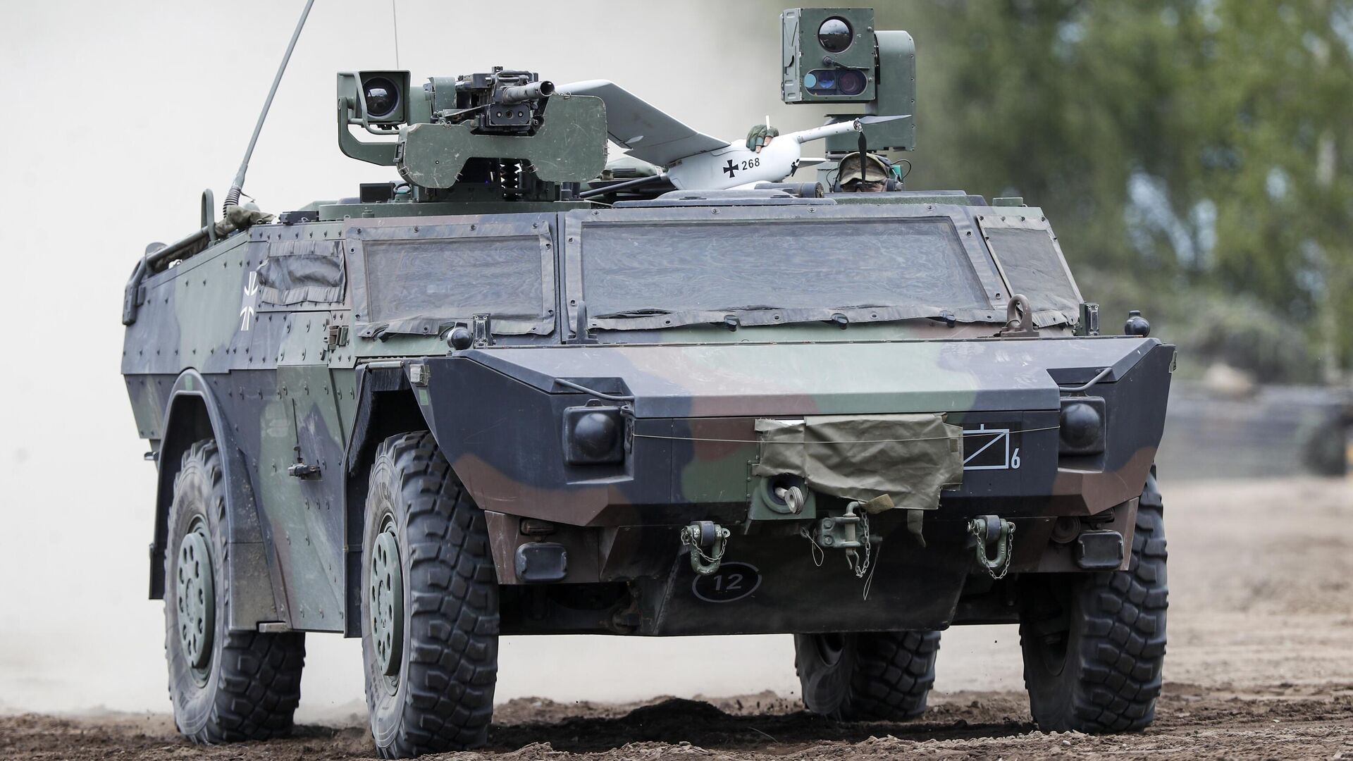 Военная машина НАТО с беспилотником на крыше во время военных учений на полигоне в Пабраде, в 60 км к северу от столицы Литвы Вильнюса в 2023 году - ИноСМИ, 1920, 09.10.2025